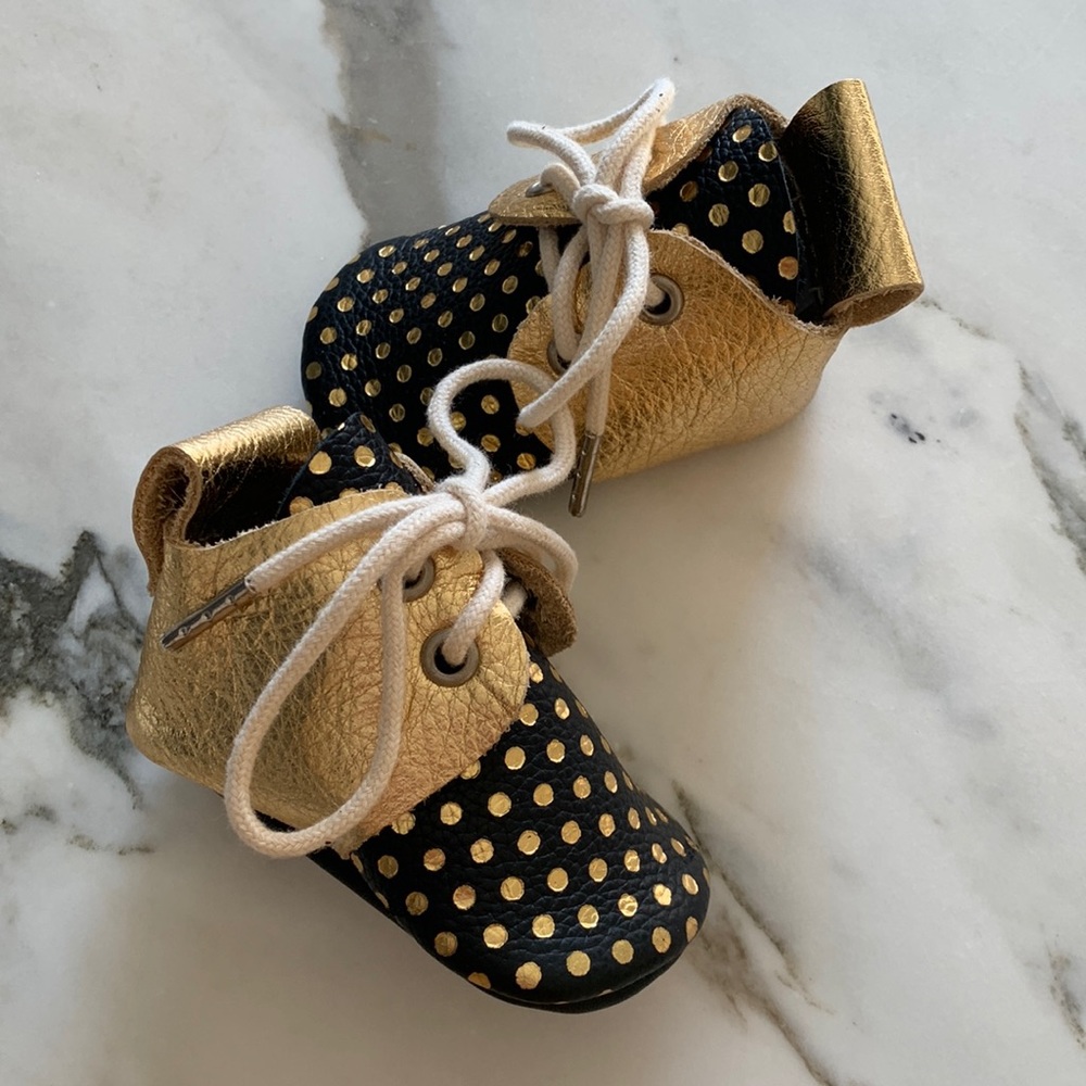 Brand new black and gold leather newborn baby booties